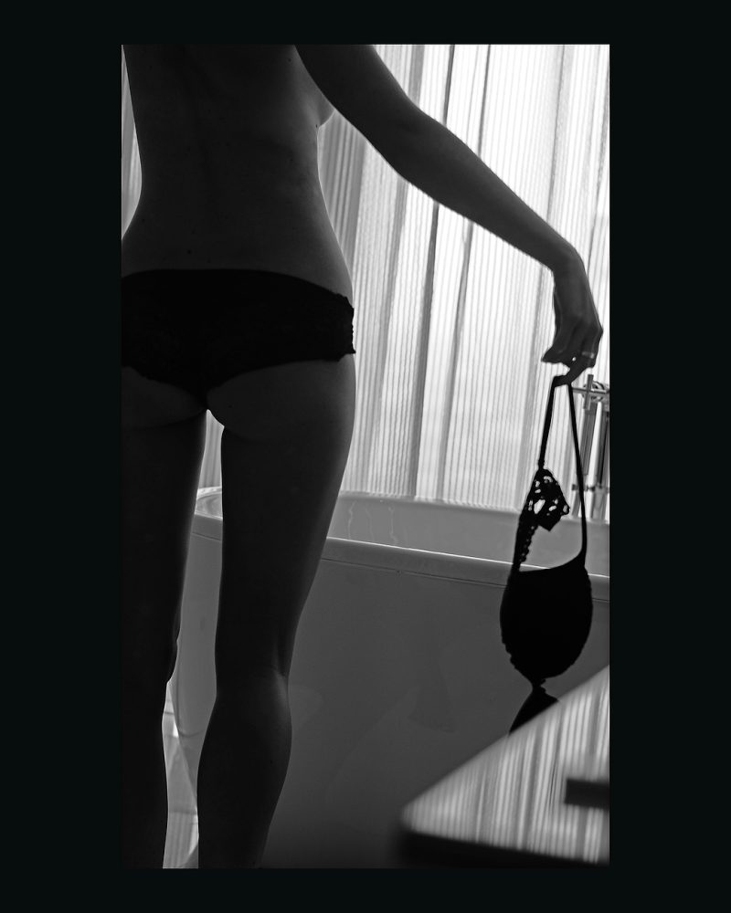 Explore Tania's sensual portraits in this captivating photoshoot, showcasing tasteful boudoir photography.